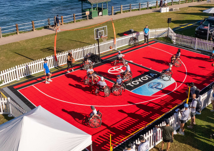 Wheelchair basketball athletes play on the Toyota adaptive basketball court during the 2026 San Diego Triathlon Challenge.